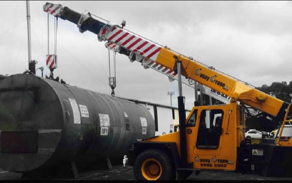 Heavy equipment transport by Casey Crane Hire